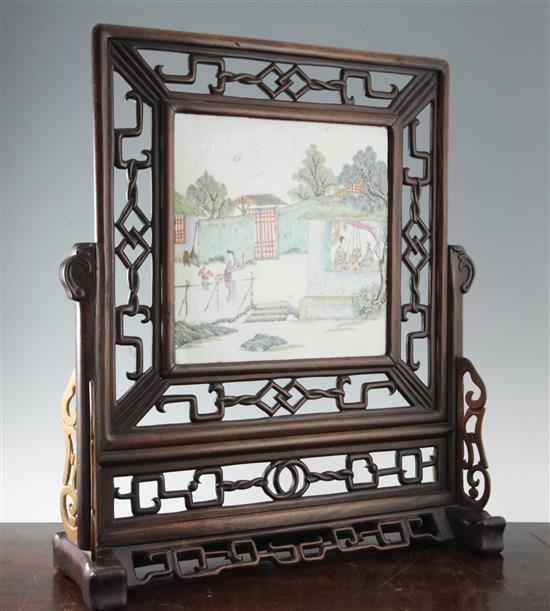 A Chinese hongmu and porcelain mounted table screen, Guangxu period (1875-1908), 61.5cm, replacement wood brackets